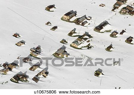 Stock Photograph - Aerial of snow covered buildings in small town, California, USA.. Fotosearch