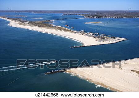Aerial view of boat entering Shinnecock Bay in New York. View Large Photo Image Stock Photograph - Aerial view of boat entering Shinnecock Bay in New York.. Fotosearch