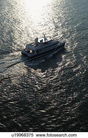Stock Photography - Aerial view of ferryboat transportation to Bald Head Island, North Carolina.. Fotosearch