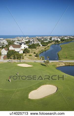 Aerial view of golf course in coastal residential community at Bald Head Island, North Carolina. View Large Photo Image Stock Image - Aerial view of golf course in coastal residential community at Bald Head Island, North Carolina.. Fotosearch