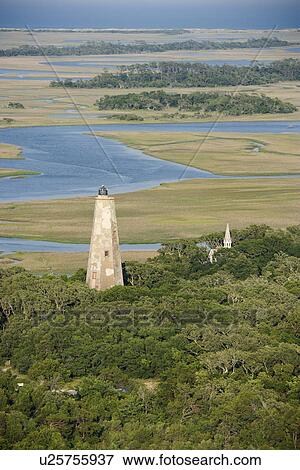 Aerial view of lighthouse on Bald Head Island, North Carolina. View Large Photo Image Stock Photo - Aerial view of lighthouse on Bald Head Island, North Carolina.. Fotosearch