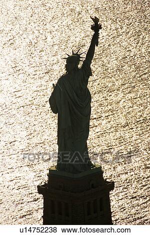 Stock Photo - Aerial view of Statue of Liberty silhouette.. Fotosearch