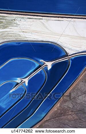 Stock Image - Aerial view of tailing ponds in Utah, USA.. Fotosearch