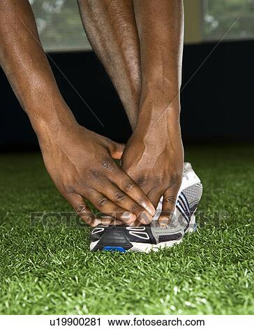 African-American male stretching. View Large Photo Image Stock Image - African-American male stretching.. Fotosearch