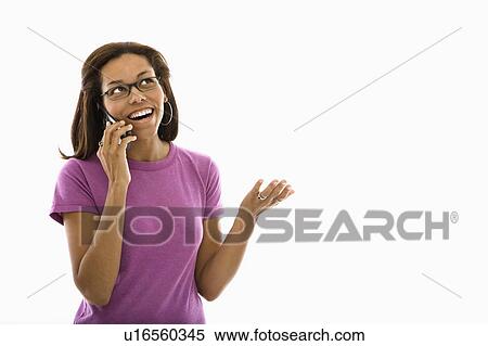 African American mid adult woman wearing glasses gesturing while talking on cell phone. View Large Photo Image Stock Photography - African American mid adult woman wearing glasses gesturing while talking on cell phone.. Fotosearch