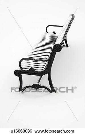 Black iron bench in snow. View Large Photo Image Stock Photograph - Black iron bench in snow.. Fotosearch