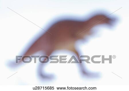 Blurred toy Tyrannosaurus dinosaur. View Large Photo Image Stock Photography - Blurred toy Tyrannosaurus dinosaur.. Fotosearch