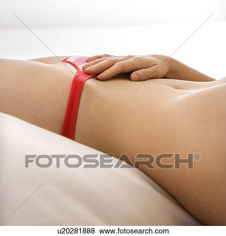 Close up midsection view of woman in striped panties lying on bed. View Large Photo Image Stock Photo - Close up midsection view of woman in striped panties lying on bed.. Fotosearch