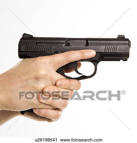 Stock Image - Close up of mid adult female Caucasian law enforcement officer hands on gun aiming.. Fotosearch