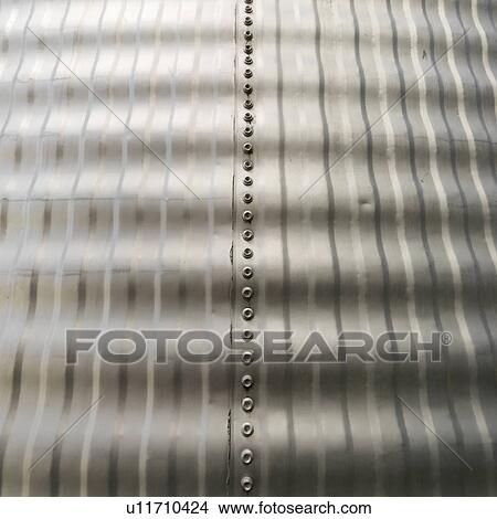 Close up view of metal silo siding texture. View Large Photo Image Picture - Close up view of metal silo siding texture.. Fotosearch