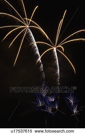 Stock Photography - Colorful fireworks exploding in night sky.. Fotosearch