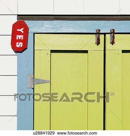 Detail of colorful doors with sign reading 'yes' at Bald Head Island, North Carolina. View Large Photo Image Stock Photo - Detail of colorful doors with sign reading 'yes' at Bald Head Island, North Carolina.. Fotosearch