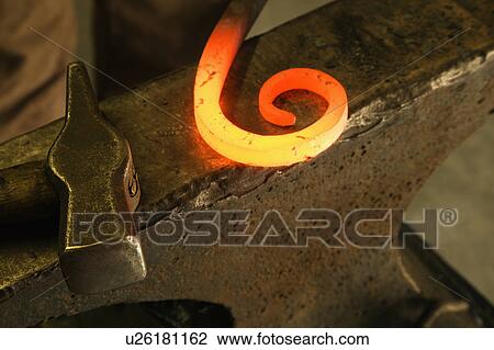 Hot shaped metal laying on anvil with hammer. View Large Photo Image Stock Image - Hot shaped metal laying on anvil with hammer.. Fotosearch