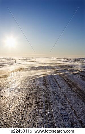 Ice covered road with tire tracks. View Large Photo Image Stock Photography - Ice covered road with tire tracks.. Fotosearch