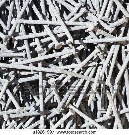 Stock Photo - Many nails piled together.. Fotosearch
