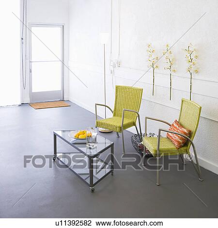 Modern room with arm chairs and coffee table. View Large Photo Image Stock Image - Modern room with arm chairs and coffee table.. Fotosearch