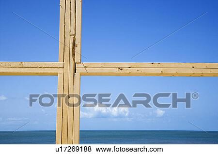 Ocean and sky behind new construction framed window. View Large Photo Image Stock Photo - Ocean and sky behind new construction framed window.. Fotosearch