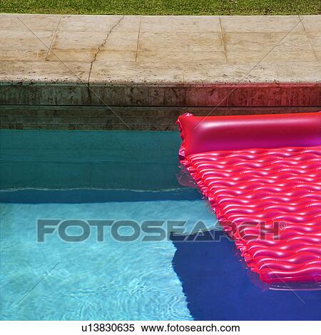 Pink float in empty swimming pool. View Large Photo Image Stock Photography - Pink float in empty swimming pool.. Fotosearch