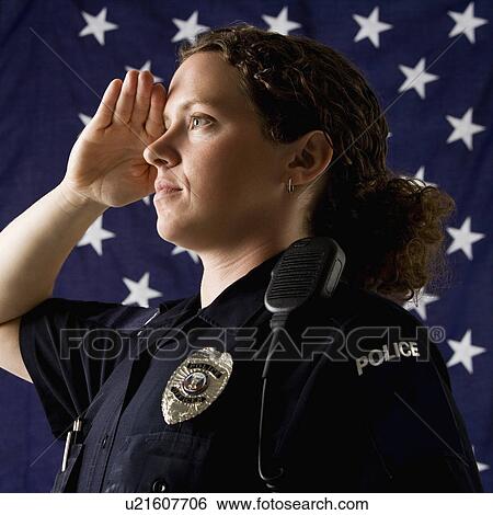 Portrait of mid adult Caucasian policewoman saluting with American flag as backdrop. View Large Photo Image Stock Photograph - Portrait of mid adult Caucasian policewoman saluting with American flag as backdrop.. Fotosearch