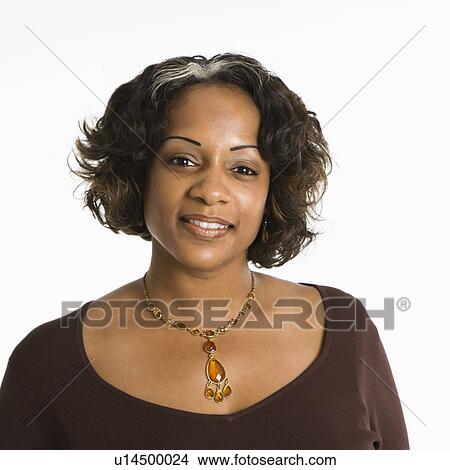 Picture - Portrait of pretty woman smiling against white background.. Fotosearch