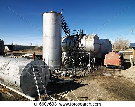 Rural landscape with metal tanks. View Large Photo Image Stock Image - Rural landscape with metal tanks.. Fotosearch