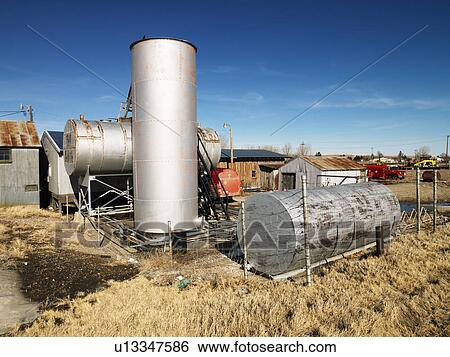 Rural landscape with metal tanks. View Large Photo Image Stock Photograph - Rural landscape with metal tanks.. Fotosearch