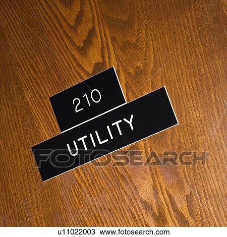 Shot of utility sign on wooden door. View Large Photo Image Stock Image - Shot of utility sign on wooden door.. Fotosearch