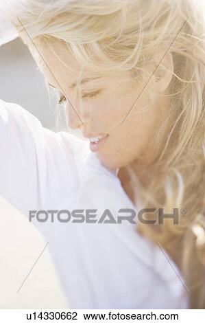 Soft light head and shoulder portrait of pretty Caucasian woman. View Large Photo Image Stock Image - Soft light head and shoulder portrait of pretty Caucasian woman.. Fotosearch