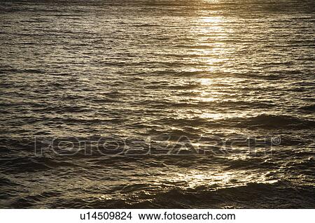 Sun reflected on water of Pacific ocean. View Large Photo Image Picture - Sun reflected on water of Pacific ocean.. Fotosearch