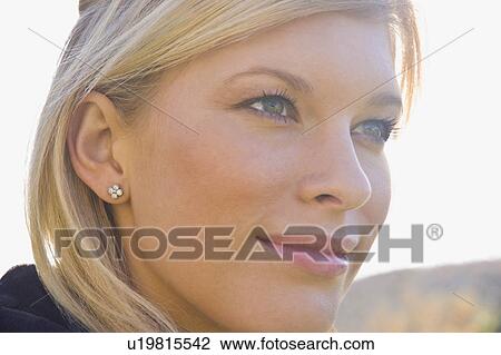 A blond female head shot View Large Photo Image Stock Image - A blond female head shot. Fotosearch
