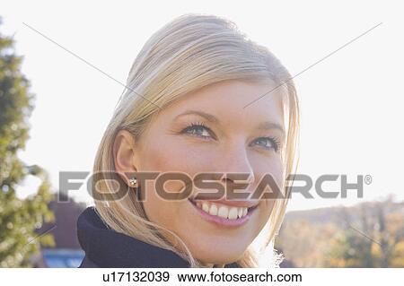 A blond female head shot View Large Photo Image Stock Photo - A blond female head shot. Fotosearch