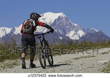 pushing a bike