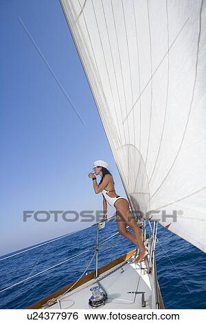Sexy captain woman sailboat View Large Photo Image Stock Photograph - Sexy captain woman sailboat. Fotosearch