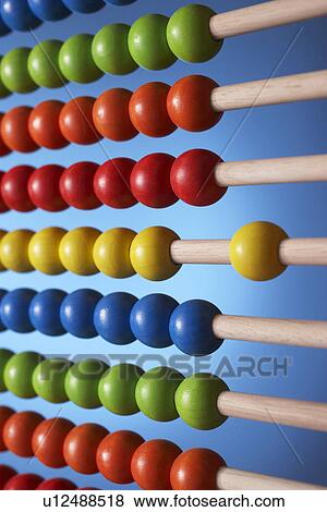 Abacus close up of rows of beads View Large Photo Image Stock Photo - Abacus close up of rows of beads. Fotosearch