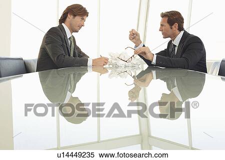 Angry businessmen in office meeting View Large Photo Image Stock Photography - Angry businessmen in office meeting. Fotosearch