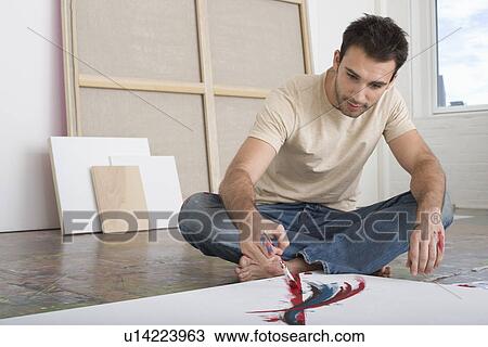Artist Working on Canvas on Floor of Studio View Large Photo Image Stock Image - Artist Working on Canvas on Floor of Studio. Fotosearch