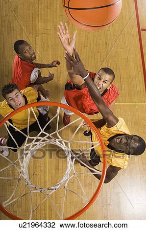 Basketball match view from above rim View Large Photo Image Stock Image - Basketball match view from above rim. Fotosearch
