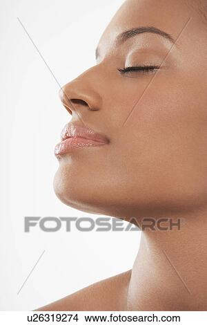Beautiful Young Woman eyes closed View Large Photo Image Picture - Beautiful Young Woman eyes closed. Fotosearch
