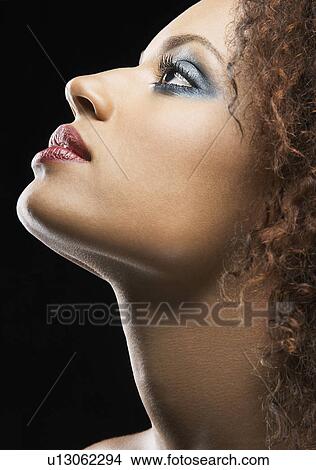 Picture - Beautiful Young Woman profile. Fotosearch