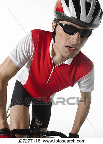 Bicyclist riding bicycle front view View Large Photo Image Stock Photograph - Bicyclist riding bicycle front view. Fotosearch