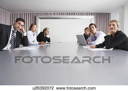 Bored Businesspeople Sitting in Conference Room View Large Photo Image Stock Image - Bored Businesspeople Sitting in Conference Room. Fotosearch