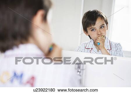Stock Image - Boy Brushing Teeth. Fotosearch