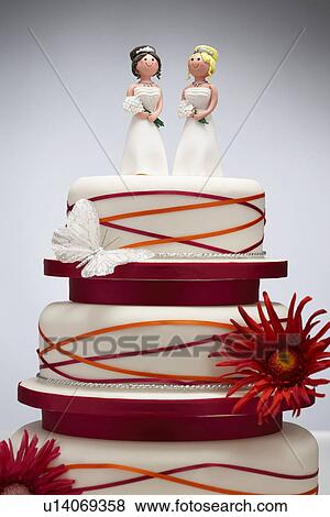 Stock Photo - Bridesmaid Figurines on Wedding Cake. Fotosearch