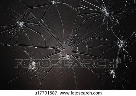 Broken glass pieced together on black background View Large Photo Image Stock Photo - Broken glass pieced together on black background. Fotosearch