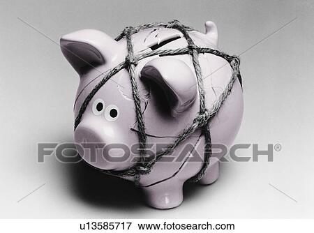 Broken piggy bank reassembled with twine View Large Photo Image Stock Photo - Broken piggy bank reassembled with twine. Fotosearch