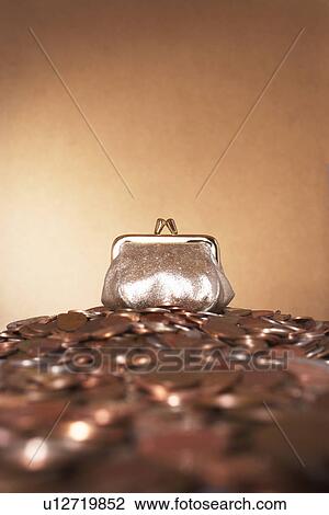 Bronze purse on heap of copper coins View Large Photo Image Stock Image - Bronze purse on heap of copper coins. Fotosearch