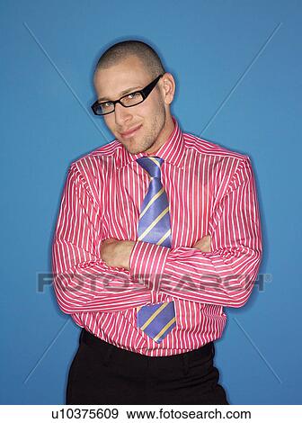 Stock Photo - Business man in glasses smiling half-length. Fotosearch