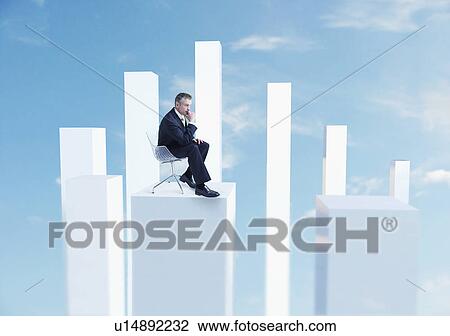 Business man sitting in chair on white pillar digital composite View Large Photo Image Stock Image - Business man sitting in chair on white pillar digital composite. Fotosearch
