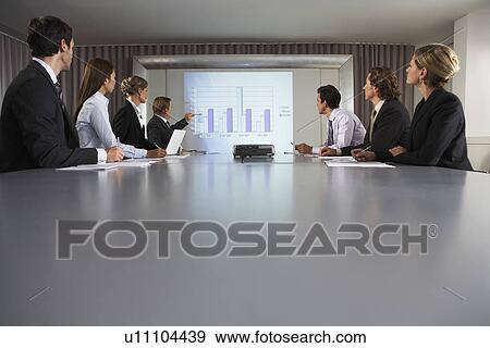 Businessman Giving Presentation in Conference Room View Large Photo Image Stock Photo - Businessman Giving Presentation in Conference Room. Fotosearch