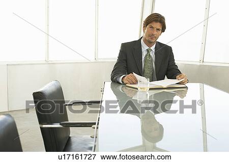 Businessman in Conference Room View Large Photo Image Stock Photo - Businessman in Conference Room. Fotosearch